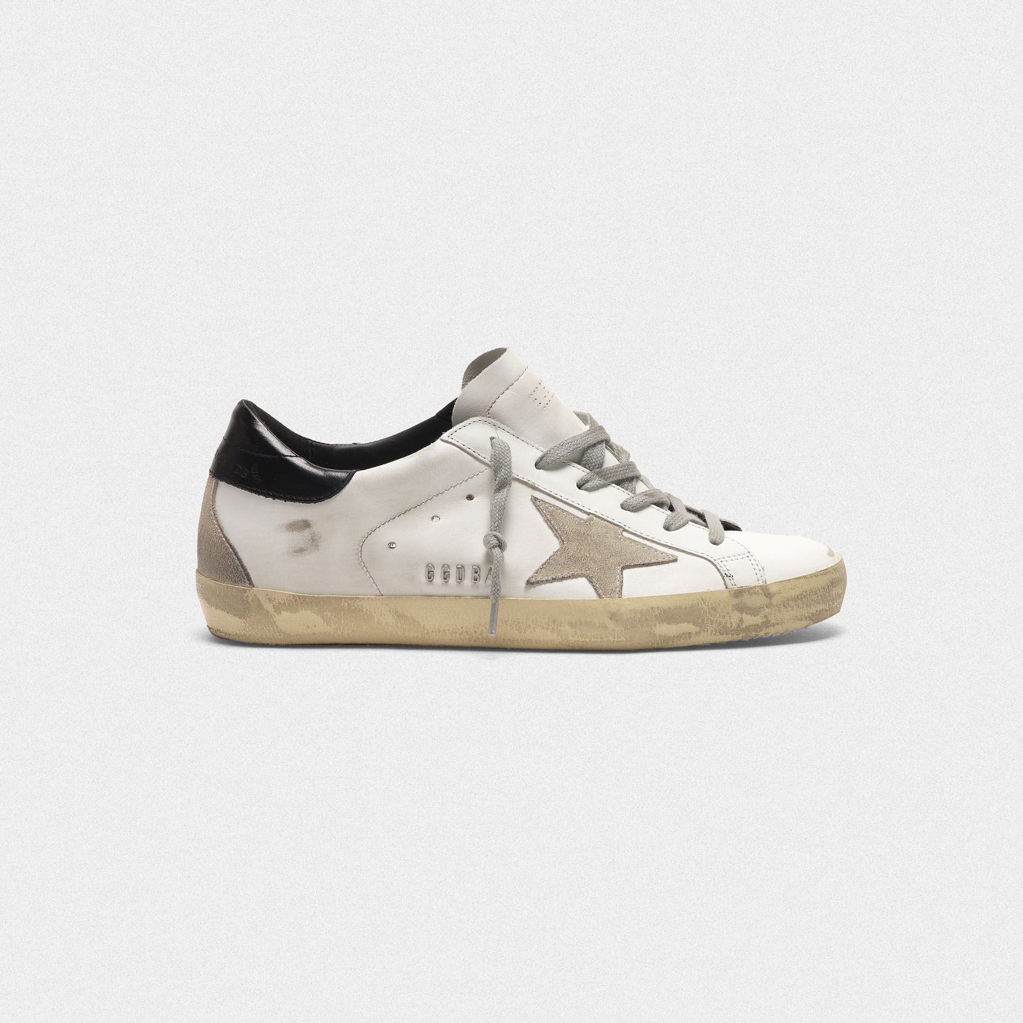 golden goose white and black superstar sneakers