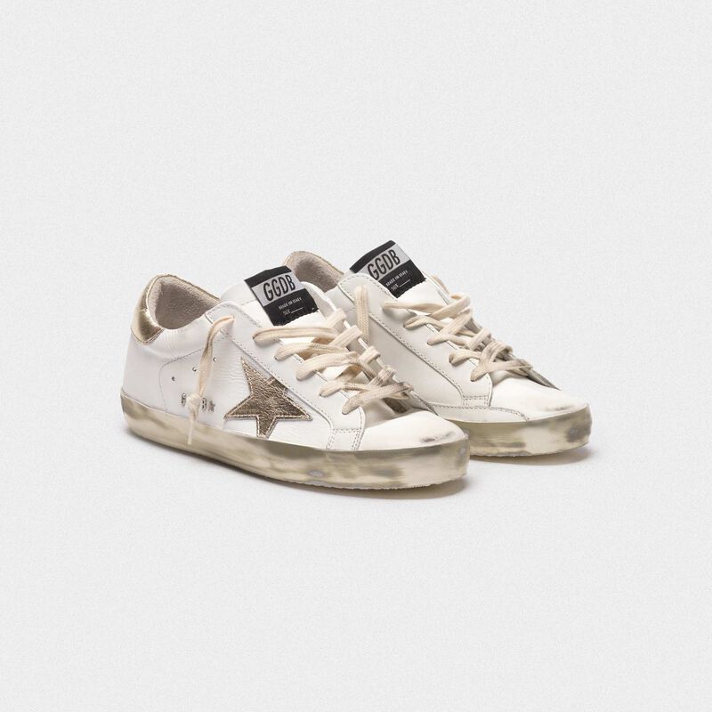 Superstar Superstar sneakers with gold sparkle foxing and metal stud ...